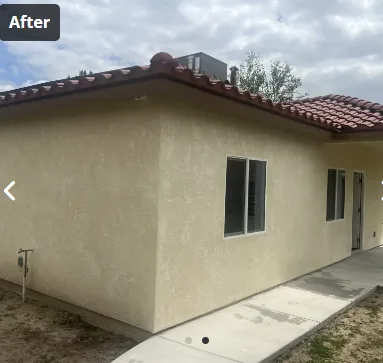 Finished room addition in Bakersfield with stucco and tile roof